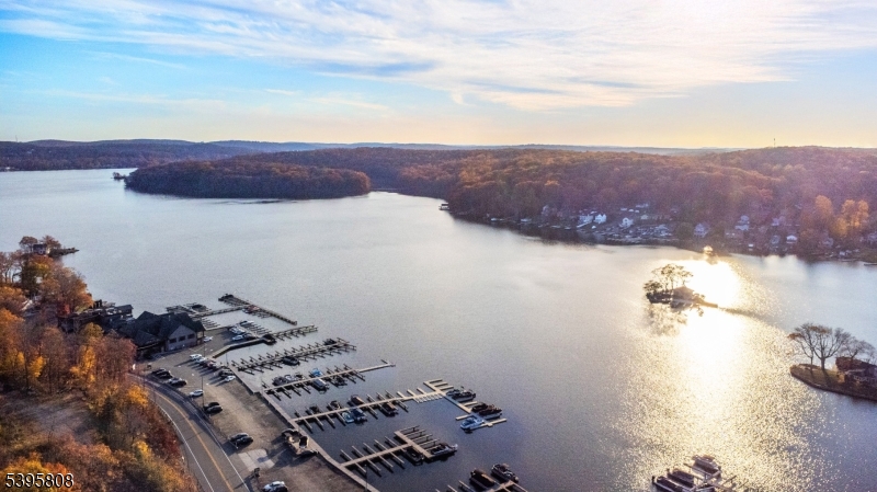 FORMER MOTEL DIRECTLY ACROSS THE STREET FROM ICONIC LAKE HOPATCONG WITH UNOBSTRUCTED LAKE VIEWS; ZONED C1 NEIGHBORHOOD BUSINESS ZONE, C2 HIGHWAY BUSINESS ZONE: (AS PER JEFFERSON TWP CODE BOOK:  RESTAURANT/NIGHT CLUB/RETAIL/HOTEL/MOTEL/SHORT-TERM RENTAL/MARINA/SERVICE GARAGE/CANNABIS RETAIL, SEE DOCUMENTS FOR ADDITIONAL INFORMATION & OPPORTUNITIES) Rare opportunity to own a highly visible Morris County property in one of New Jersey?s premier recreational destinations. Positioned across the street from public marinas, waterfront restaurants, wedding venue, this location benefits from the energy and attraction of the vibrant year-round lake community that continues to draw visitors, boaters, vacationers, and full-time residents alike. Located less than 50 miles from NYC and approximately 45 minutes to Mountain Creek Resort and the Delaware Water Gap National Recreation Area, the property is ideally situated near some of the region?s top recreation, tourism, dining, and entertainment destinations. Lake Hopatcong, spanning over 2,600 acres, remains one of the most recognized and active lake communities in the state, creating strong long-term potential for well-positioned properties in the area.  A unique opportunity in a prime lake-view setting with exceptional visibility, accessibility, and future possibilities.  Currently 9 buildings/24 units. Vacant, NO ACCESS, STRICTLY SOLD AS-IS, WHERE-IS. Buyer to do Due Diligence regarding usage/zoning.