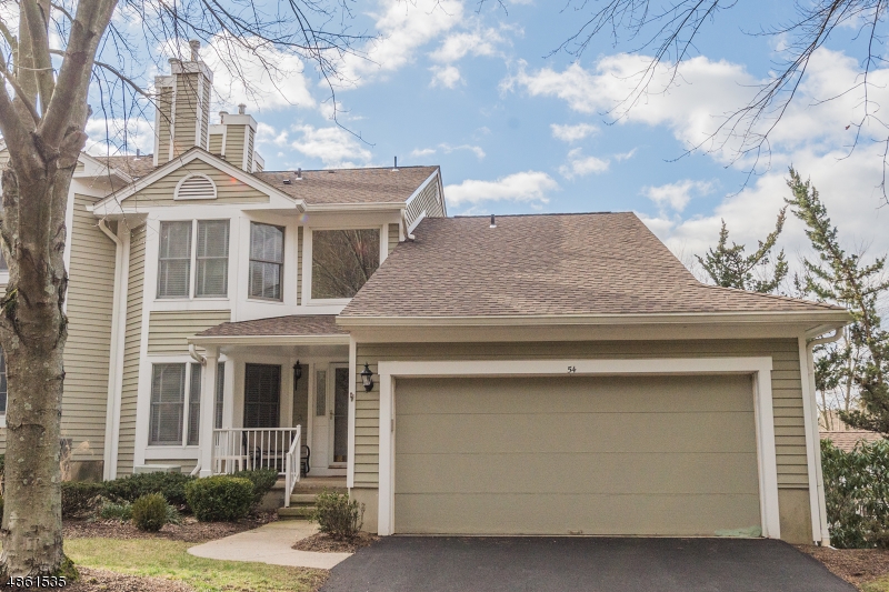 This 2016 newly renovated townhouse is full of high-end updates. Fully finished basement makes a great home office or Den. Gorgeous south-west views off private deck, sunny location, quiet street. Upon entering, the 2 story foyer welcomes you home. Immediately notice how fresh & clean this beautiful updated townhouse feels, freshly painted, w/ cherry floors, new  bedroom carpet, custom closet, & more! Enjoy the gracious open flow floor plan, making this the perfect space for entertaining. The Newly renovated gourmet kitchen is complete w/ newer SS appliances, cherry cabinets, slate floors, granite counters, in-cabinet lighting, & butlers pantry. Bedrooms have private baths. The Master ensuite bath is a luxury spa escape. Intricate trim, plenty of storage, rare opportunity in the Hills 2 Car Garage!