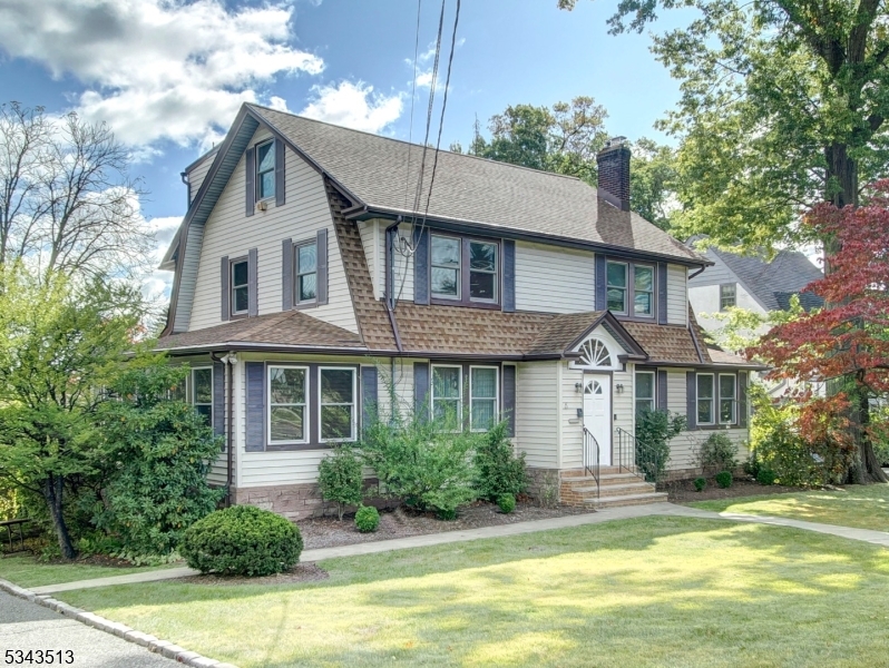 Completely renovated in 2023, this beautiful 4 Bedroom, 3 full & 2 Half bath home is ready for its new owners. First level features a gorgeous, chef's eat-in kitchen with granite counters, skylights, center island with additional sink, a huge living room with wood burning stove, dining room, office and den and Pwder Room.  Wood floors throughout. The second floor has a stunning primary ensuite--complete with full bath with shower stall, giant walk-in closet plus bonus sitting room that could be used as a nursery, Two additional bedrooms plus another full bath complete the 2nd floor.  Walk up to the third level to find a private additional suite/bedroom with some glass walls, full bath inc jacuzzi bath tub and glass enclosed shower.  And as an added bonus--a walk-out terrace with sweeping views. And for additional living space, you'll love the full finished, walk-out basement, with multiple rooms, half bath and full laundry room with newer washer & dryer.. Additional highlights: wood floors throughout, all new Anderson windows, skylights, fenced-in backyard, roof is 2 years old, newer furnace, new Coleman A/C units and hot water tank installed in 2024 and home generator. Chimney, fireplace & flue are "as is" with no known issues. Easy access to NYC bus on corner, jitney to South Orange Midtown direct train, major highways, restaurants and shopping.