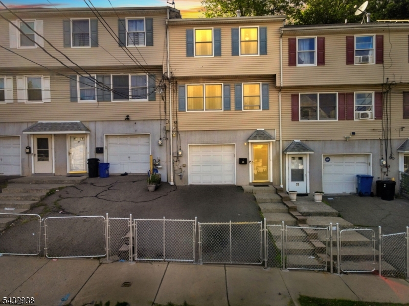 Welcome to your beautifully renovated 3-bedroom, 2-bath home, perfectly situated in the vibrant heart of Paterson. With a modern touch and attention to detail, this remarkable 3-story residence offers an exceptional blend of style, comfort, and convenience. The first floor features an attached garage accommodating one vehicle, alongside a laundry room and a spacious storage area, providing practicality for everyday living.As you ascend to the second floor, you?ll find a spacious kitchen, a bright dining room, and an inviting living room that creates a perfect environment for entertaining. This level also includes a conveniently located bathroom and easy access to the beautiful backyard, ideal for outdoor enjoyment.Retreat to the third floor, where comfort reigns supreme. The primary bedroom offers a peaceful getaway, along with two additional bedrooms that are perfect for guests or a home office. A full bathroom on this level ensures convenience for all residents. Recently renovated in 2025 and featuring a new roof, you'll have peace of mind knowing that this home is move-in ready. Enjoy the benefits of living in a prime location, just minutes from schools, shopping centers, and major transport routes, making everyday errands and commutes effortless. Don't miss the chance to make this stunning home your new sanctuary!
