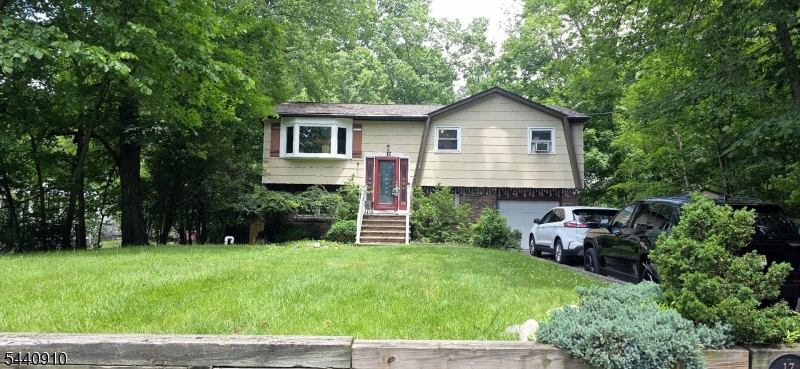 Step into this hidden Gem. Bi-Level in Hopatcong featuring 3 Spacious bedrooms, 1 Full bath , 1 Powder Room, Formal Dining Room, Open Living Room. Kitchen, Finished Lower Level Perfect for additional rec room & Home Office. 1 Car Attached Garage and a beautiful yard ready for entertaining.
