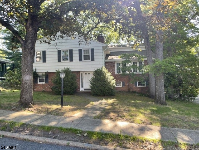 Rare opportunity to be the second owner of this home.  Bring your own style to   this 5 bedroom , 4 full bathroom combines both split level and colonial designs. the flexible floor plan offers generous sized bedrooms and multiple living areas which provides the opportunity for additional people or live in assistance.  Private dead end street location in a residential neighborhood with quick and easy access to Route 23, 46  and 80.  Enjoy the peaceful large rear yard for entertaining. , gardening, or simple relaxation. .Square foot information obtained from tax assessor records. Buyer should confrim actual .