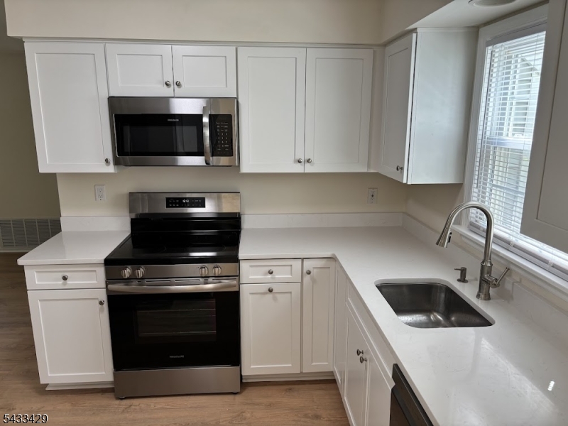 2 Bedroom/2 Bath First Floor Condo in desirable Hunters Crossing! Direct access to front door without any steps! Totally renovated, including brand new Kitchen Cabinets, Quartz Countertops and Stainless Steel Appliances! New Vinyl Flooring and Paint throughout! Available July 1, 2026.