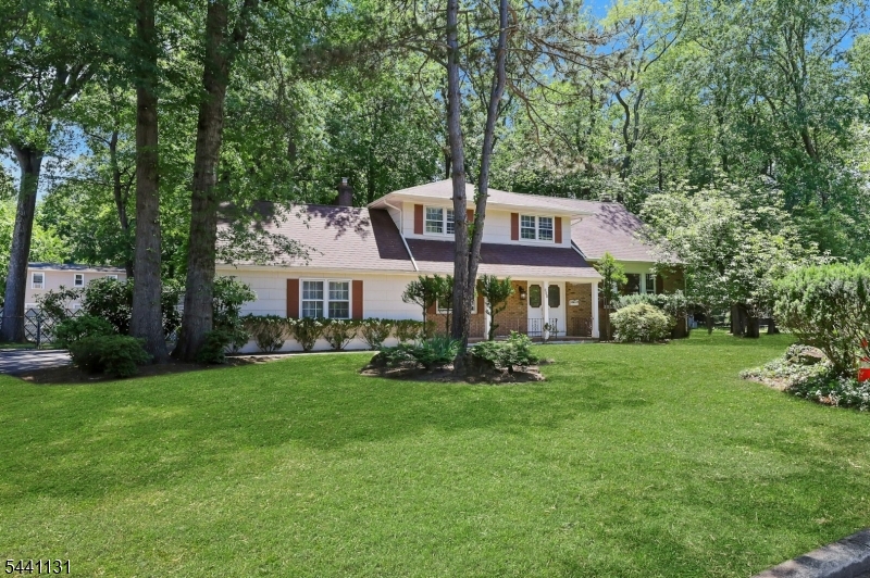 Very spacious Sugar Maple Split on tree-lined cul-de-sac! Fantastic, convenient location and neighborhood with easy access to Hwy 17 and GSP. Unlimited potential. Enter into the Den level of this home, which features a wood-burning fireplace and sliders to a large two-level deck and wide backyard. One bedroom on ground level too. Main level has wood floors throughout a large living room and formal dining room. The galley kitchen is spacious and has a separate casual breakfast area, also with sliders to the deck! 2nd floor has 3 bedrooms, including the original Primary BR with en-suite full bathroom, while the 3rd floor has another Primary with walk-in closet and vaulted ceilings. Basement is partially finished and offers future build-out possibilities. This property has a wide, level backyard with gorgeous shade trees creating a private retreat space. This is a special and unique home with lots of potential and must be seen in person! Needs TLC, House sold in "as is" condition.