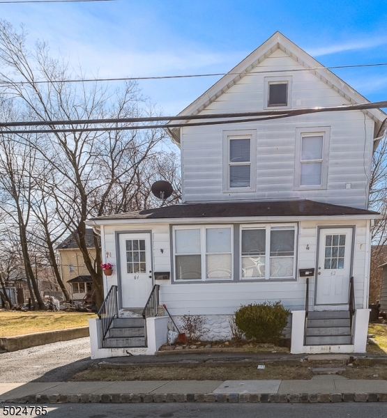 OPPORTUNITY KNOCKS!!INCOME PRODUCING RENTAL ON DBL LOT AND DETACHED GARAGE. RENOVATED AND FULLY RENTED 2 FAMILY INVESTMENT PROPERTY. SOLD AS IS.