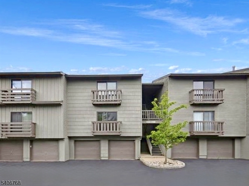 Experience comfort and tranquility in this beautifully maintained 1-bedroom, 1-bath condo located in the desirable Spruce Hills Condominium community of Glen Gardner. Surrounded by nature and set in a peaceful environment, this home offers a relaxing retreat from the everyday. The spacious living area features sliding glass doors that open to a large private patio perfect for morning coffee, evening relaxation, or entertaining while enjoying the serene outdoor setting. The kitchen was thoughtfully remodeled in 2024 with new cabinetry, a new countertop, and durable vinyl flooring, complemented by a new refrigerator and dishwasher installed in 2025. The bathroom also features new vinyl flooring, adding a fresh, updated feel. Additional highlights include an in-unit washer and dryer, abundant natural light throughout, and a well-designed layout that balances comfort and functionality. Residents enjoy access to community amenities including a swimming pool, basketball and tennis courts, and a dog park. Move-in ready and ideally situated in a scenic, nature-filled setting, this home offers an excellent opportunity for both homeowners and investors.