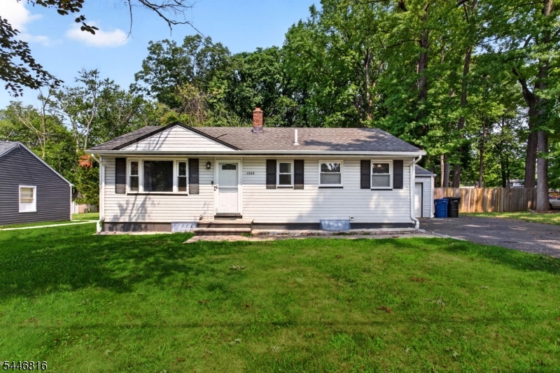 Great home located close to schools, parks,shopping and public transportation. This 3 Bedroom ranch sits on a large lot with fenced yard and feature wood floors, central air, newer kitchen and bathroom as well as a spacious basement rec room. Make this your new home