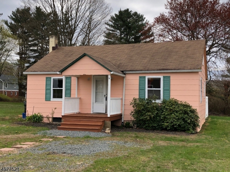 Real life dollhouse waiting for you to add your flair and finishing touches to the updates that have already been done. Set on a one-third acre level lot in beautiful neighborhood, walk-up attic and full basement. Updated maple kitchen, updated bath, new carpeting, heat controls in every room. Top-notch schools. Good commuter location, located within minutes of Routes 206/80/46/10. Close to grocery stores, restaurants, parks and more! Opportunity is knocking - answer the door! NEW 2BR SEPTIC TO BE INSTALLED PRIOR TO CLOSING.