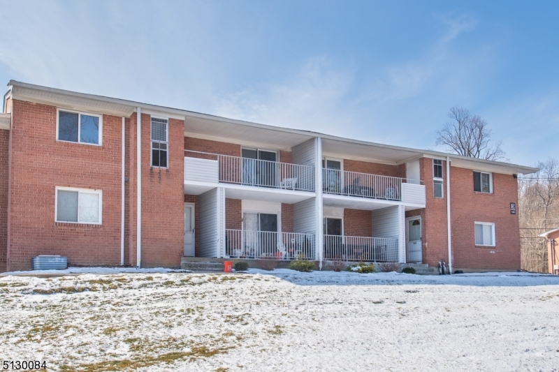 Immaculate commuter dream! Bottom Floor Condo! Nicely maintained w/many upgrades such as stainless steel appliances. Beautiful hardwood floors throughout, carpeting in bedrooms. Large living area w/dining & galley kitchen. Sliders to slate balcony. Two generous sized bedrooms and full bath w/tub shower. Located at the rear of the complex. Ample parking with more visitor spaces available. Take advantage of all Cedarbrook has to offer! Amenities include; pool, tennis courts, playground and picnic areas. Perfectly located near shopping, restaurants, major commuting routes and transportation. Close to All Major Highways Routes 10, 287, 80 & 202 plus the Morris Plains Train station & other NYC Direct Transportation. Great school district. Laundry in the basement.