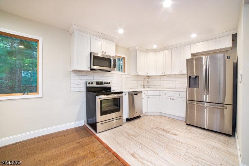 BACK ON MARKET!!!  BEAUTIFULLY FULLY RENOVATED 3 BEDROOM 2 FULL BATH BI-LEVEL CLOSE TO BUDD LAKE HOME FEATURED NEW ROOF, SIDING, WINDOWS, CABINETS, COUNTERTOPS, STAINLESS STEEL APPLIANCES. CLOSE TO SHOPPING, RESTRAUNTS AND ROUTE 80 FOR AN EASY COMMUTE.