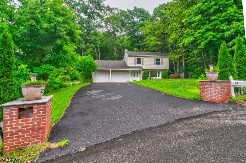Beautifully renovated Colonial located in the desirable Barry Lakes section of Highland Lakes! This move-in-ready home offers approximately 2,000 sq ft of living space with 3 bedrooms, 3 full baths, and a flexible floor plan. Spacious living room, separate family room, and an additional oversized living area currently being used as a 4th bedroom, home office, or recreation room. Updated kitchen with center island opens to the dining area, making it perfect for everyday living and entertaining. Private primary suite with full bath. Major 2023 improvements include a new HVAC system, new septic system, renovated interior, and new driveway. Enjoy the oversized deck overlooking state land with a peaceful stream, providing exceptional privacy and a scenic setting. Barry Lakes residents enjoy lake privileges, beaches, boating, fishing, and year-round recreation. Conveniently located near Mountain Creek, golf courses, hiking trails, shopping, dining, and commuter routes. A rare opportunity to own a beautifully updated home in one of Vernon's most desirable lake communities!