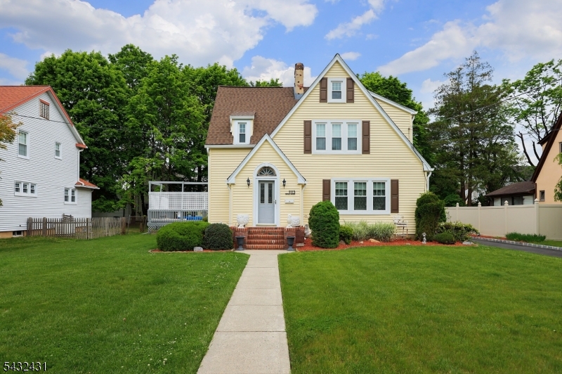 Set on a beautiful piece of property in Plainfield, this three-bedroom, 1.5-bath home offers charm, space, and the kind of setting that immediately feels special. Inside, an entry foyer welcomes you into a comfortable living room, with a formal dining room that creates an easy flow for everyday living. A small den off the dining area adds great flexibility for a home office The kitchen offers plenty of function, and the butler?s pantry is a standout feature, providing extra storage and prep space. Upstairs, the bedrooms are oversized and provide great space. The walk-up attic is a huge bonus, waiting to be finished and offers exciting potential. The partly finished basement adds even more usable space, perfect for a rec room, music room, playroom, etc. Outside, the park-like backyard is the real showstopper, with beautiful space to relax, entertain, and enjoy the seasons. A detached garage and above-ground pool complete the property, making this home a wonderful opportunity