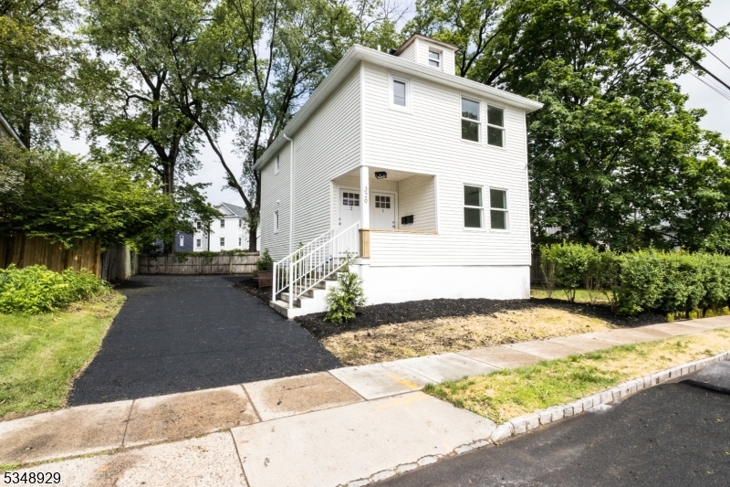This a stylish, fully renovated 2-bedroom, 1-bath apartment ideally situated in a charming multi-family home just moments from downtown Westfield. With brand-new everything, this modern gem offers sleek design, high-end finishes, and thoughtful details throughout.The bright and airy living space boasts stylish flooring, contemporary lighting, and a neutral color palette that's perfect for any decor style. The modern kitchen shines with stainless steel appliances, quartz countertops, and semi-custom cabinetry blending style with functionality. Both bedrooms offer ample closet space, and the spa-inspired bathroom features elegant tile work and modern fixtures. Enjoy the convenience of in-unit laundry and off-street parking for added ease. A very large unfinished basement is accessible from inside the apartment offering plenty of storage. Outdoor enthusiasts will appreciate the outdoor space, perfect for relaxing, grilling, or soaking in the fresh air. Located just minutes from Westfield's vibrant downtown, top-rated schools, and convenient public transportation, this apartment offers the perfect combination of style, comfort, and location. Don't miss your chance to make this stunning space your new home.