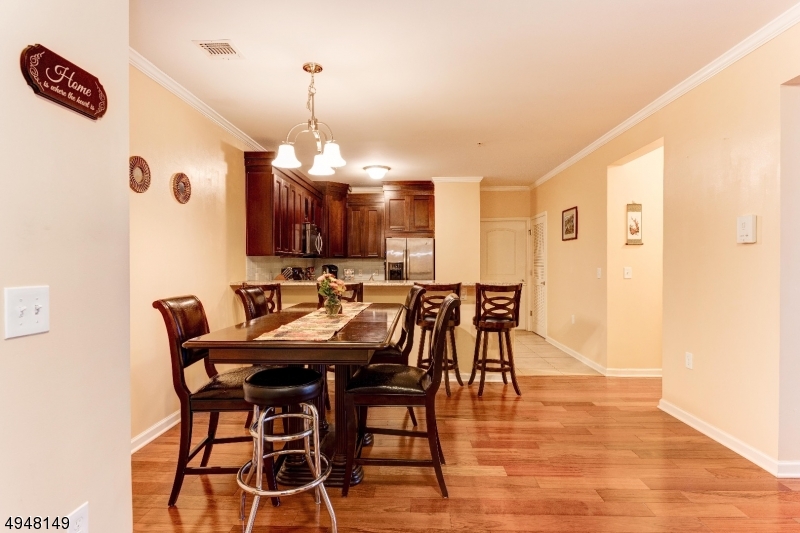 Live the life of luxury in this gorgeous Sapphire condo that is perfect for commuters that need to travel to NYC or anywhere that needs a train. Train station is one block away! The building offers different amenities such as an assigned parking space with extra parking spaces in the back for guests or second cars, a gym, extra storage space in the basement for each unit, and a common room for hosting parties! This condo is perfectly situated: between the train, all major highways, and downtown Linden, you don't need to go anywhere else! The building has been completely sold out, so come see this luxurious condo before it's too late!