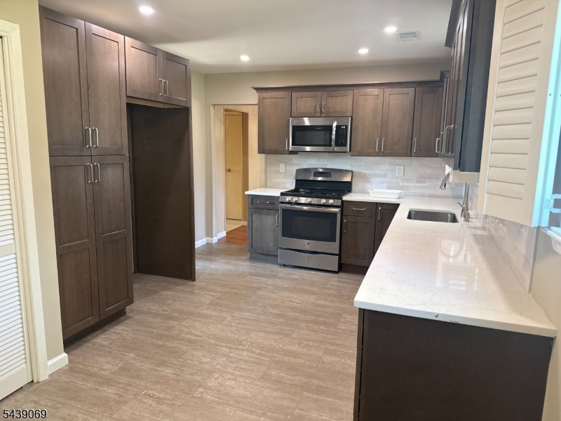 FOR SALE AS IS, BEAUTIFUL SPACIOUS 2 LEVELS OF LIVING SPACE OVER 2,000 SQ FT ON A 12,000 SQ FT LOT. 4 BEDRMS 2.5 BATHS, NEW KITCHEN, ROOF AND HVAC COUPLE YEARS OLD. NEEDS SOME MINOR TLC. XLARGE LOT WITH GARAGE.  BACK YARD IS 10,000SQ FT TO FIT YOUR DESIRES. COME TAKE A LOOK!