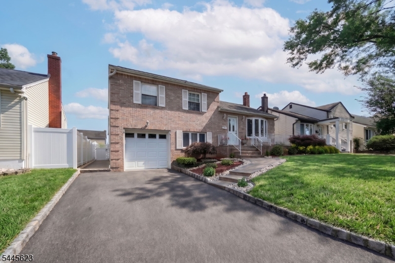 Welcome to this well maintained split-level home in the desirable Livingston neighborhood, offering a warm, inviting layout with generous living space and outdoor amenities. The main level features a bright and airy living room, an elegant dining area overlooking the lower level, and a bright kitchen with crisp cabinetry, and a spacious breakfast bar with sink. A few steps down, the comfortable family room is centered around a cozy fireplace and opens directly to the backyard deck, creating an easy flow for indoor-outdoor entertaining. This level also includes a charming built-in bar, a convenient half bathroom, and a versatile bedroom that could serve as a guest room, home office, or hobby space. Upstairs, the primary bedroom offers a private en suite bathroom with a double vanity, accompanied by two additional bedrooms and a common bathroom. The finished basement adds even more flexible space with a welcoming den, recreation area, and a dedicated laundry space with abundant cabinetry and storage. Outside, the fully fenced backyard feels like a private summer outing complete with a sparkling in-ground pool, expansive patio, and covered outdoor oven and bbq area. Conveniently located just blocks from local bus service and approximately one mile from Union Train Station.