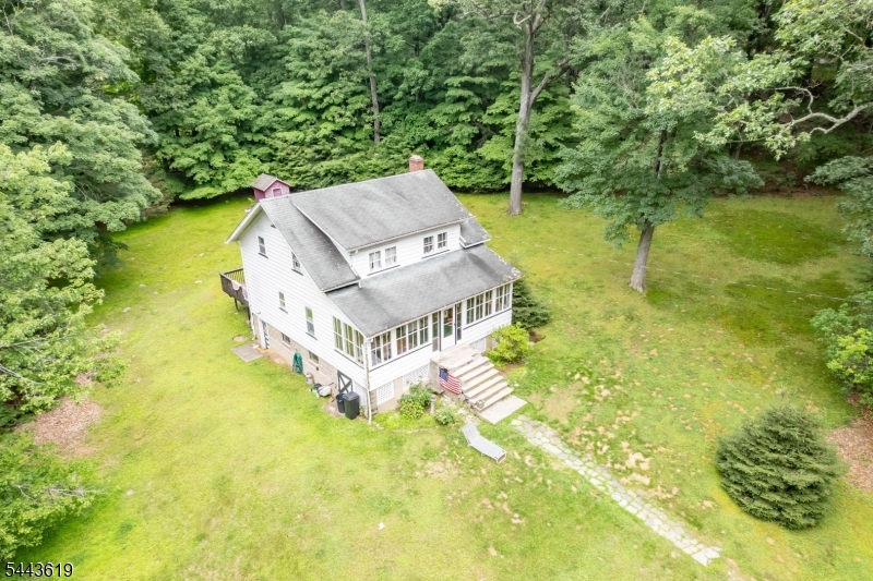 Opportunity is Knocking! Needs Work. Possible Subdivision, Just Beautiful 4 & 1/2-acre property. 3 bedrooms, den, 1 & 1/2 baths, hardwood floors on the first and second floor. Front Porch Overlooking Expansive Lot. Deck off kitchen. Laundry and Utilities in Walk Out Basement. Being sold totally AS IS, Whereas. Water test & town cert responsibility of the buyer. In Ground Oil Tank. Any Unwanted Contents Remain. Highest & Best offers by Wednesday July 15 by 5:00 pm