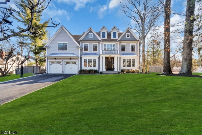 Welcome to this exquisite, BETTER THAN NEW 7 bedroom, 5 full, 1 half bath Center Hall Colonial located in one of Chatham's most sought after locations. Custom built in 2017, this home boasts a welcoming open foyer, 9ft ceilings on 1st & 2nd floors, gleaming H/W floors throughout, a custom designed kitchen w/ large center island & separate eat-in area. The stunning chef's kitchen which is set just off the oversized garage & mudroom with custom built-in cubbies, flows seamlessly into the spacious FR w/gas fireplace. Sliding doors conveniently located just off the kitch and FR lead to a beautiful, large patio & private, level fenced yard.Other features of the 1st level are a formal DR with tray ceiling, a private LR area & a sun-filled bedroom/home office with private full bath. On the second level you will find a stunning Primary Suite complete with a spa-like bath w/soaking tub,a large walk-in shower,custom vanity w/2 sinks, a separate toilet room & 3 spacious walk-in closets. Completing this lvl are 4 addtnl spacious bedrooms w/ custom closets, 2 more large bathrooms & custom laundry room. The LL boasts a huge recreation space, another bedroom & full bath, & an abundance of storage.This one-of-a-kind home complete w/full house generator is PERFECT for entertaining & is located proximate to all Chatham top-rated schools, town & mid-town direct train ! Not to be missed!!