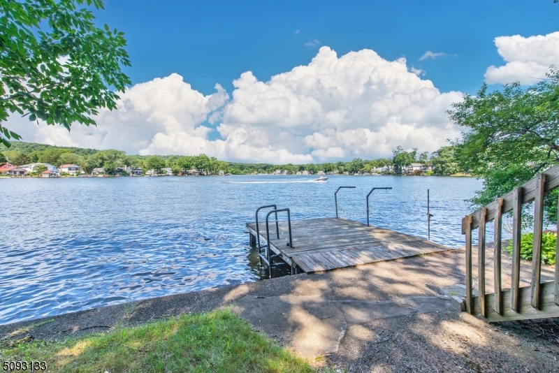 LAKEFRONT Apartment with stunning, year-round views. Direct access to lake. Currently tenant occupied, available to move in June. (Photos are from previous listing when vacant) Open floor plan, spacious living space on one floor. Bedroom overlooks lake as well. Enjoy lake lifestyle with your own deck & dock. Great location! Extras include a half bath -nice for entertaining. Laundry room & storage area and/or a 2nd smaller bedroom. Additional storage in basement. The location can't be beat. Landlords painting deck and treating dock. Indian Lake offers lots of joy with swimming, boating (motor boats allowed), fishing, ice-skating in the winter or just plain ol' relaxation -taking in the scenery & great community energy.* Walking distance to Denville, which is the Hub of Morris County with NYC direct train & buses. Near Rt. 80, 287, 46 and 10.  A very walkable DWTN with plenty of shopping, restaurants  - all that is needed to make life simple & convenient. (*ILCC membership required to use beaches & boats). Landlord prefers no dogs due to barking but open to discussion, okay with cats.