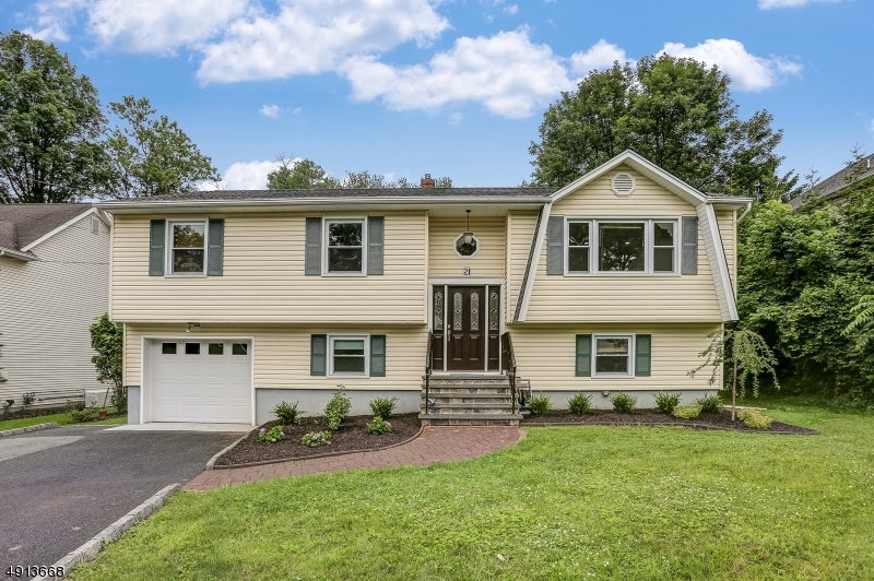 Fabulous home in sought after Hanover Twp.  This Cedar Knolls Bi-level features 4 beds, 2.5 updated baths including a master bedroom with its own full bath. Living Room, Dining Room and spacious Family Room with carpet. Eat-in kitchen with gas stove/microwave, dishwasher and refrigerator. Hardwood floors in LR, DR, and upper level bedrooms.  Large backyard.  Township has a beautiful town pool (additional fee) , community center, before/after school programs and much more. Low property taxes & excellent schools. Convenient location with easy access to major highways.  Minutes away from Morris Plains station with NYC Midtown Direct Train. Easy access into downtown Morristown.
