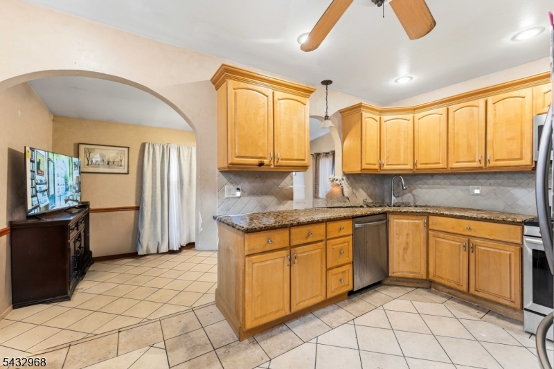 Welcome to this charming 4-bedroom, 2-full-bath home in the highly desirable borough of Kenilworth! Offering a versatile layout and plenty of space, this home is a fantastic opportunity for buyers looking to add their personal touch while enjoying all that Kenilworth has to offer.The first floor features a bright living room, an updated kitchen with ample cabinetry, a dining area perfect for everyday living and entertaining, two bedrooms, a full bath, and convenient access to the backyard. Upstairs, you'll find two additional bedrooms, providing flexibility for guests, a home office, or growing households. The finished basement adds even more living space with a comfortable family room and a second full bath.Outside, enjoy a paver driveway, detached garage, and backyard with an above-ground pool being sold as-is. The property is being sold strictly as-is, presenting an excellent opportunity for buyers seeking value in a sought-after location. Conveniently located near shopping, restaurants, parks, major highways, and NJ Transit bus routes with service to New York City, making commuting a breeze. Don't miss this chance to own a great home in one of Union County's most desirable communities! Home Selling Strictly as-is. Need TLC.
