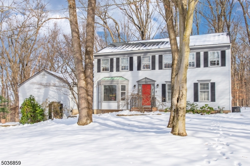 Fantastic cul de sac location within Nestlingwood.  Public water, sewer & gas, backs to town land for privacy.  Oversized colonial includes office and bonus room on 1st floor, vaulted ceilings, eat- in kitchen with center island, first floor laundry, newer Trex deck, newer roof and skylights, newer garage doors, 2 zones/units of HVAC and newer hot water heater, all appliances included and less than 5 years old.  Recent Nutone whole house intercom system with CD player and speakers throughout,  Primary bedroom features sitting room and full bath with jetted tub and stall shower, 3 additional spacious bedrooms and main bath with double vanity.  Huge unfinished basement has possibilities.  Excellent West Morris High School district, minutes to shopping, theater, dining. 36' Wells Cargo trailer w/title included!