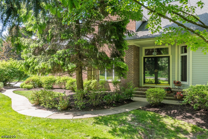 Upscale town home in prime community with  master bedroom on the first floor.  You will be delighted when you see the  Brazilian wood floors in the entry, hallway and kitchen The kitchen has cherry  cabinets, granite counters, ceramic tile back splash, pantry closet, new french door black stainless steel refrigerator, plantation shutters, and sunny breakfast area.  The renovated master bathroom features cherry cabinets, granite counters, claw foot bathtub, seamless shower doors, cherry linen closet and medicine cabinet. Living room and master br both have vaulted ceilings.The loft area is a great  place to relax. Two good size bedrooms and a renovated main bath conclude the second level.  The huge basement is great for storage or ready for you to finish.