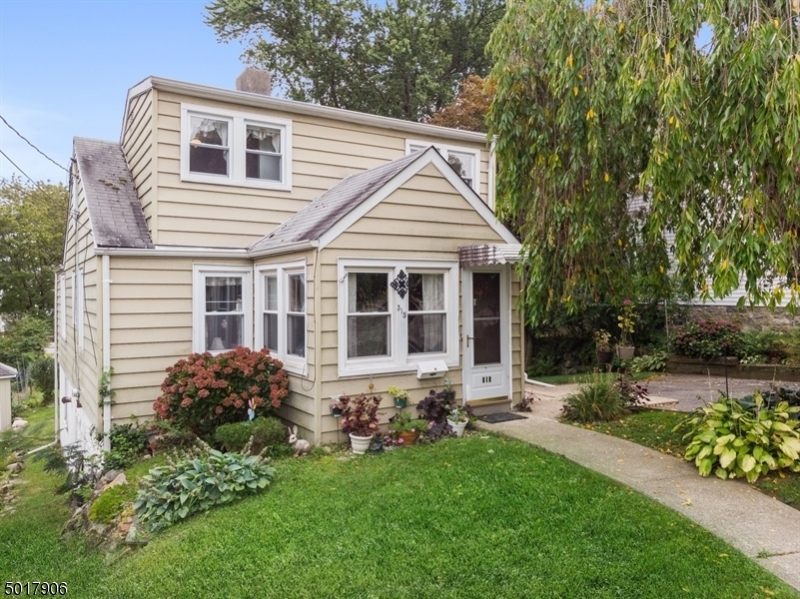 Bright/sunny Cape Cod w/ 3 BRs, Office, Full Bath & Garage (potential) on Beautifully Landscaped Lot, Quiet Neighborhood. Features a 4 Season Sunroom, LR w/ Brick FP, Eat-in Kitchen. MBR & Full Bath are located on the 1st Fl. The 2nd Fl features 2 Additional, Generous Sized BRs, Basement has a Laundry Room, Storage Room & Workroom. Private Backyard offers room to play & relax. Refrigerator &Washer/Dryer are Negotiable. Minutes to Downtown Shops, Offices, Restaurants, NJ Transit Boonton Station & Rtes 80 & 287