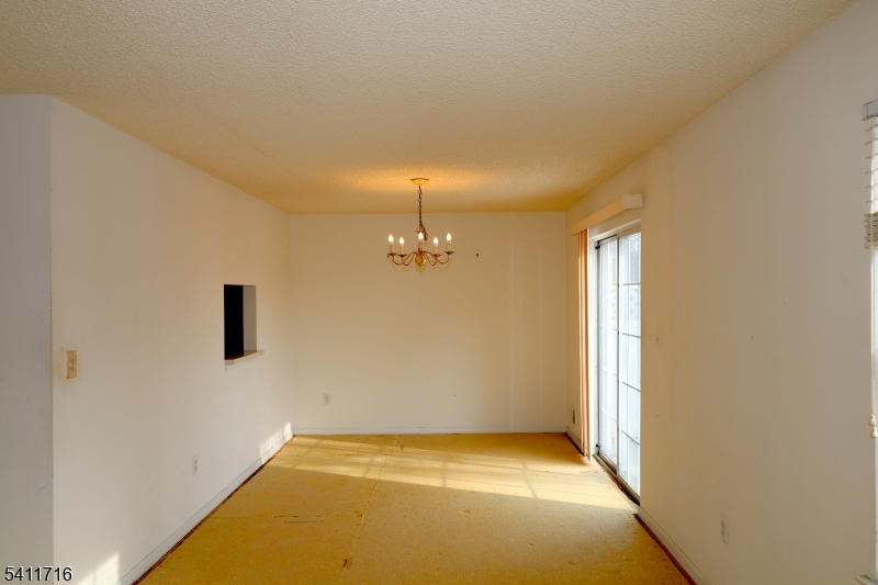 FIXER-UPPER OPPORTUNITY " END UNIT TOWNHOUSE Unique investment opportunity in the sought-after Society Hill Neighborhood! Conveniently located in the desirable University Heights section of Newark, just minutes from the Essex County Court Complex. Don't miss this multi-level end-unit townhouse in need of rehab, offering excellent upside potential. The main level features a kitchen, living/dining area, laundry, half bath, fireplace, and balcony. The upper level includes three bedrooms and two full bathrooms. Ideal for investors or buyers looking to renovate and customize in a prime location. Buyer is responsible for all city inspections and certifications. Property is being sold AS-IS strictly. Property priced to reflect condition