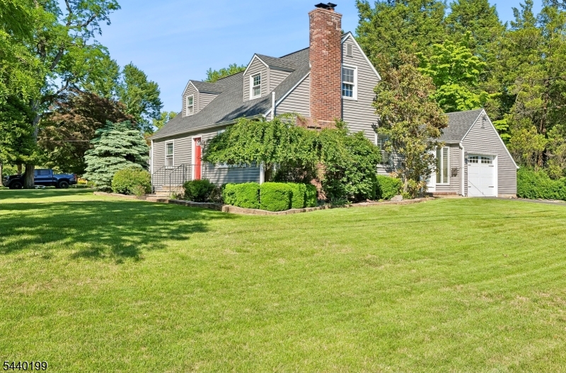 Welcome home to this pristine four-bedroom, two-bath expanded Cape Cod, set back on over a quarter-acre lot in one of Scotch Plains most sought-after neighborhoods. This charming home features a kitchen with ample cabinetry, granite countertops, and stainless-steel appliances. The inviting living room is highlighted by a wood-burning fireplace, perfect for relaxing and entertaining. The home offers four bedrooms, along with generous closet space throughout. A bright breezeway overlooks the backyard and leads to an expansive deck, patio area, and private yard, creating the perfect setting for outdoor entertaining or peaceful enjoyment.The finished basement features high ceilings and includes a cozy den, a home office, a utility room for mechanicals and storage, and a bonus workshop. Filled with character and charm, this home is a true gem in one of the area's most desirable neighborhoods. A commuter's dream, the home provides convenient access to major highways, public transportation, shopping, dining, and top-rated schools.This home has been thoughtfully updated with major exterior improvements, including a new roof, siding, and gutters in 2021. The shed was installed in 2020, a fully renovated main bathroom completed in 2020, and upgraded den and office space in 2023. The water heater is approximately five years old, providing added peace of mind for the next owner.