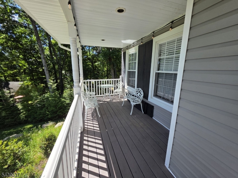 This exceptional Colonial home, built in 2000 and extensively renovated in 2019 with high-end finishes, offers the perfect blend of elegance, comfort, and modern convenience. Nestled on a picturesque property with a private orchard and sweeping countryside views, this home is truly one of a kind.A charming front porch welcomes you with breathtaking views of the rolling landscape. Inside, the grand two-story foyer features soaring ceilings and oversized windows that fill the home with natural light. Designed for both everyday living and entertaining, the spacious formal sitting room flows seamlessly into the dining room. .Upstairs, you'll find four generously sized bedrooms and two full bathrooms. The luxurious primary suite features elegant coved ceilings, a large walk-in closet, and a spa-like en-suite bathroom complete with a soaking tub, oversized walk-in shower, and dual vanities. Additional bedrooms offer ample closet space and abundant natural light.The fully finished walkout basement provides incredible versatility, with expansive living space ideal for recreation, fitness, media, or guest accommodations. This level also includes a half bath, mechanical room, and sliding glass doors leading directly to the backyard.
