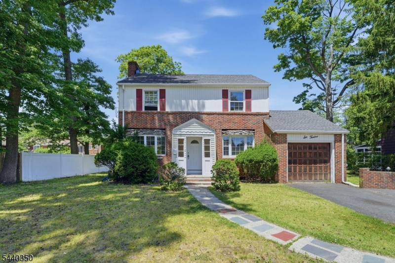 Charming & Spacious Colonial! This home offers the perfect blend of character and functionality. The first floor features a welcoming living room, a formal dining room perfect for entertaining, and a bright sunroom overlooking the backyard, an ideal space for relaxing, working from home, or enjoying your morning coffee. The attached garage provides everyday convenience, while the finished basement offers additional living space perfect for a recreation room, home office, gym, or guest area. With its classic colonial layout and versatile floor plan, this home is ready for its next owner. Don't miss this opportunity!