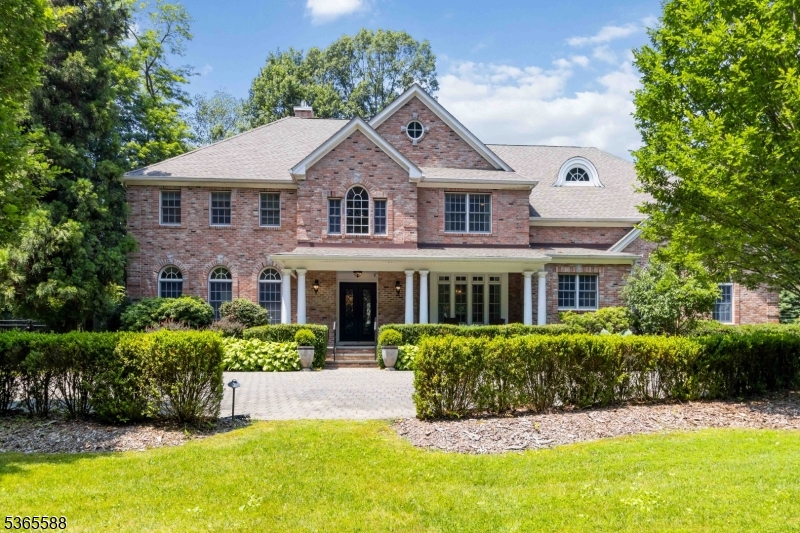 Stunning Custom Home in Sought-After Spring Brook Section of Morris Township. This chic and impeccably styled 6 Bedroom, 5.1 Bath home offers elevated living and serene privacy with a quiet cul-de-sac location across from peaceful green space. Soaring ceilings, a dramatic 2-story foyer and living room, and a flowing layout set the stage for effortless elegance. The fabulous Chef's kitchen with large center island, breakfast area, sitting area and separate scullery, opens to beautifully designed spaces with French doors, custom millwork, and a sophisticated neutral palate. Ensuite bedrooms, 3 gas fireplaces, spacious walk-in California-style closets, and radiant heating throughout the entire home. Fabulous lower level with entertainment area, billiards room, gym, second office, and 6th bedroom with full bath. The professionally landscaped outdoor oasis features a fire pit, gas grill & bar area, and cutting and vegetable gardens. And a full-house generator too. Stylish, luxury living at its finest! All this is within walking distance to the shops, restaurants & PAC in downtown Morristown with easy commuter access via NJ Transit Mid-Town Direct. This fabulous home is not to be missed!