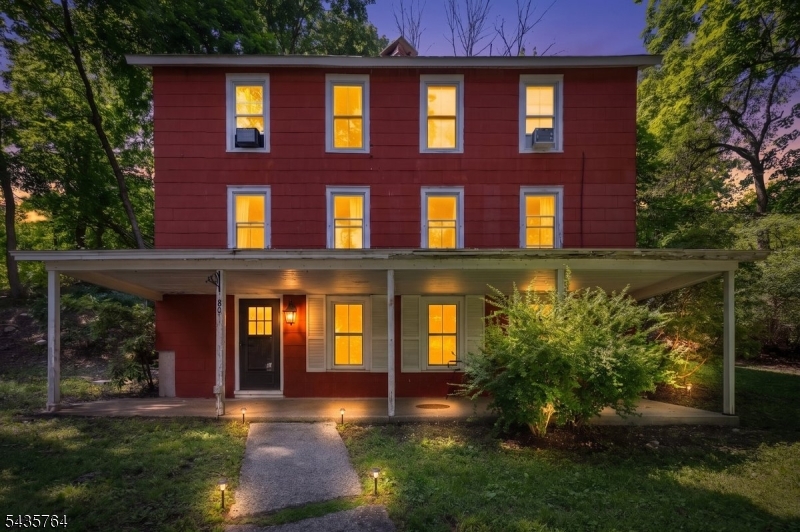 Nestled on a generous parcel of land in the heart of town, this charming Colonial blends timeless character with thoughtful modern updates. Classic architectural details and inviting living spaces create the perfect balance of warmth and functionality. A desirable first-floor bedroom with its own ensuite bath offers flexibility for guests, multi-generational living, or a private home office.Step outside to a spacious patio, ideal for entertaining, summer barbecues, or relaxing outdoors. Located just moments from Newton's historic Main Street, you'll enjoy easy access to local shops, restaurants, community events, schools, parks, and everyday conveniences. Major commuting routes are also nearby, making travel a breeze.A rare opportunity to own a home that combines classic Colonial charm, modern comfort, flexible living space, and an exceptional in-town location.