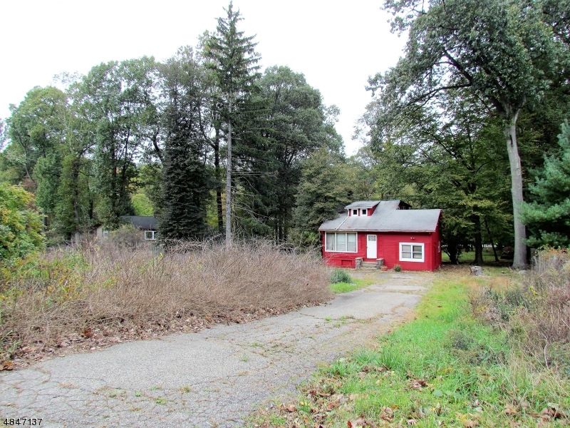 Build Your Dream Home or Fix It Up! HUGE lot with AMAZING potential! Great location! Great School System! Just blocks away from the Beautiful Shongum Lake! Property needs total renovation.  Value on Land. Sold strictly AS IS. Sewers in street. Seller will not consider credits or reductions pending inspection or attorney review. Buyer responsible for all inspections and certificates.  Cash or 203K loan. Blue-Print and Survey available. Public water hooked up. Sewer in street.