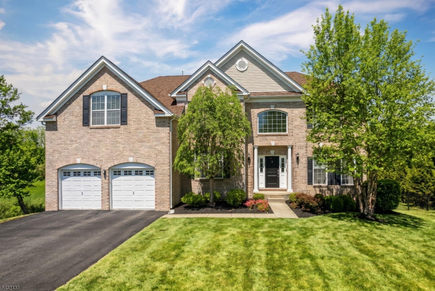 Welcome to 7 Heaton Street, a stunning 4-bedroom, 3.5-bath Harvard Colonial in the prestigious Morris Chase community of Mount Olive Township. This beautiful Toll Brothers home features a brick-front exterior, professionally landscaped grounds, and a fenced backyard offering privacy and curb appeal, with an underground sprinkler system for easy lawn maintenance. Step inside to find hardwood flooring and new carpeting throughout, with fresh paint creating a warm and inviting feel. The open-concept kitchen flows seamlessly into the dramatic two-story family room, providing the perfect space for everyday living and entertaining. The main level also offers a formal dining room, elegant living room, private office/den, powder room, and convenient laundry room, with 9ft ceilings. The second floor features a spacious primary suite with an expanded sitting area, with two walk-in closets, and spa-like ensuite bath with a jetted tub, stall shower, and double vanity. Two generously sized bedrooms share a full bath, while the princess suite includes its own private bath a. Enjoy Morris Chase amenities including a 5,000-square-foot clubhouse with a catering kitchen, billiards room, fitness center, heated outdoor pool, basketball and tennis courts, beach volleyball court, two tot lots, and easy access to Turkey Brook Park. Conveniently located near Mount Olive schools, shopping, restaurants, and major highways. A rare opportunity in one of Mount Olive's most desirable communities.