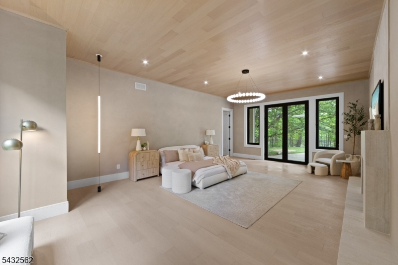 Introducing 809 W. Shore Road, a fully renovated, approximately 9,000-square-foot residence in Smoke Rise, offering refined lake living with modern construction and design. This six-bedroom, six-and-a-half-bath home was completely reimagined by JLA Interiors and built by Peak Developers, combining thoughtful planning with quality craftsmanship. A 20-foot great room forms the center of the home, with expansive windows that frame serene lake views and bring in abundant natural light. Stucco exterior finishes lend a clean, contemporary profile that complements the setting. The oversized kitchen is designed for both everyday use and entertaining, with generous workspace, storage, and direct connection to the main living areas and outdoor spaces. The layout supports a natural flow from cooking and dining to relaxation by the pool or in the great room. The primary suite functions as a private retreat, featuring two large walk-in closets and a spa-like bathroom with a carefully considered layout and finishes. Each additional bedroom is paired with access to well-appointed baths, providing comfort and convenience throughout the home. Outdoor living is a key highlight, with a pool that overlooks the lake, creating a strong indoor-outdoor connection and an ideal setting for seasonal enjoyment. Note: Association fees to be verified.