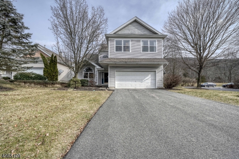 Welcome to Crystal Springs and Tannery Hill. One of the most sought after addresses in Crystal. This updated large house is on quiet serene setting on a Cul-de-Sac on the golf course. This lovely neighborhood has a private community heated pool. Beautiful hardwood floors, high ceilings, freshly painted and new carpet. The spacious main level has eat in kitchen, family room with gas fireplace and large living and dining room area. Upstairs has large master bedroom with vaulted ceiling, walk in closet and large bath with jetted soaking tub. 2 more bedrooms, a loft, and full bathroom complete upstairs level. The huge finished basement has rec room to entertain.  Enjoy the expanded deck looking at the golf course, mountain views, and custom landscape with koi pond. There is newer refrigerator, dishwasher,