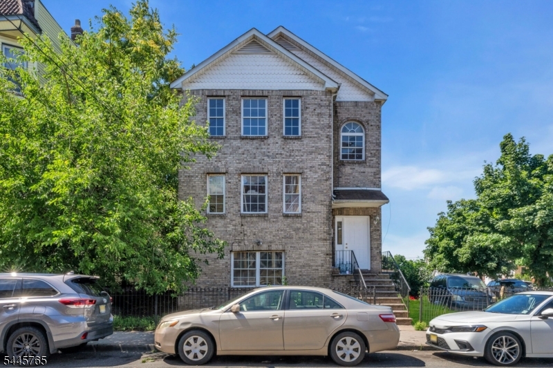 Exceptional fully renovated investment opportunity in the heart of Newark! This modernized multi-family property features two spacious residential units plus a bonus ground-level unit, offering a total of 10 bedrooms and 5 full bathrooms. Every inch has been thoughtfully updated with contemporary finishes, making this a true turnkey opportunity.Delivered completely vacant, this property provides unmatched flexibility for both investors and owner-occupants. Live comfortably in one unit while renting out the others to significantly offset your mortgage, or lease the entire property to maximize cash flow and generate exceptional rental income.With its spacious layouts, updated interiors, and income-producing potential, this is a rare opportunity to own a move-in-ready multi-family property in a strong rental market. Whether you're looking to house hack or expand your investment portfolio, this property offers outstanding value and limitless possibilities.