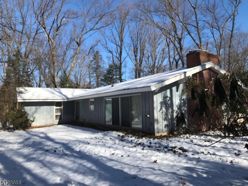 Buyer responsible for CO. Cash, 203 K loan, or construction loan, As is sale. Ranch with vaulted ceiling great room. 3 Bedrooms and 2 baths. Vacant. Heating system does not work. Beautiful setting , one acre lot. Perfect to build your dream home. Tree lined street. Home vacant , possible mold issue go in at own risk. No heat, complete re-do, or build your dream home!! HIGHEST AND BEST TERMS DUE BY FRIDAY, FEBRUARY 18TH