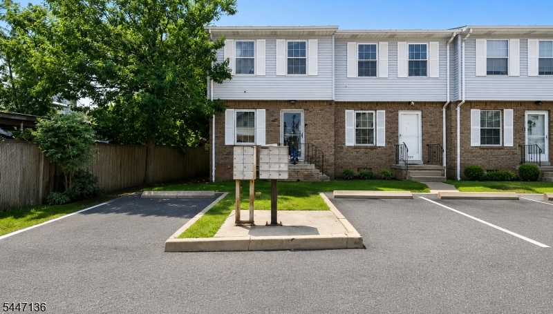 Welcome to this well maintained three-level townhouse in the sought-after Private Terrace Condominium community. Offering 2 bedrooms, 1.5 bathrooms, and a finished basement with a den, bonus room, and in-unit laundry, this home provides flexible space to fit a variety of lifestyles.The main level features an inviting living and dining area with sliding glass doors leading to a private patio and grilling area perfect for relaxing or entertaining. Thoughtful updates include newer windows, furnace, and central air (2017), plus a water heater replaced in 2020, providing added peace of mind.Additional highlights include two assigned parking spaces and an HOA fee that includes homeowner's insurance, helping simplify homeownership. Conveniently located less than 1/2 mile from NYC-direct bus service, this home offers an ideal combination of comfort, value, and commuter convenience. Don't miss the opportunity to make this move-in-ready townhouse your next home!