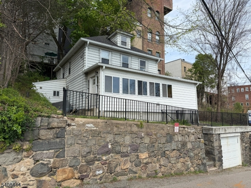 Great opportunity for a Colonial home with big upside potential - small yard and little upkeep super close to stores and shopping. Located in  B-1 zone adds even more possibility .Large rooms, 3 floors, and older charm with a little bit of work will make this a super future project.  Owner is licensed realtor