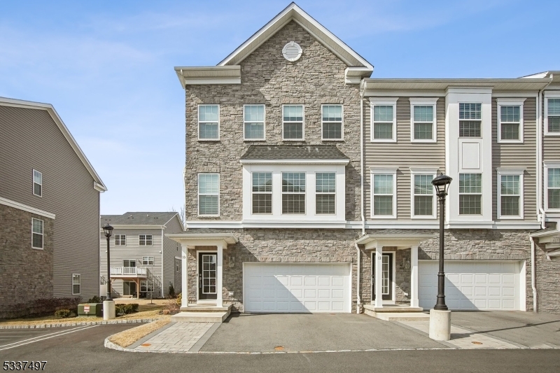 Neutrally decorated young three level Pershing townhome  - Main door leads you upstairs you'll find the main living area. Open concept so you can cook and entertain all at once. Ample windows fill this home with natural light. Beautiful Kitchen with SS appliances, Vented range hood, White Shaker cabinets, pantry closet & a huge Island. Tucked off the kitchen is a private nook with a desk and extra cabinet space & access to deck. A powder room & coat closet on this level too. Hardwood floors on main level continue upstairs landing & master suite. Second Level has master bedroom has a walk-in closet and en-suite bathroom with double sink vanity. On this floor are two additional bedrooms with carpets, hall bathroom also with double sink vanity and linen closet, plus conveniently located washer and dryer. Two-car garage brings you into a spacious bonus room overlooking a private patio. This is a versatile space that can be multi functional -The perfect hang out spot, media or even another bedroom complete with full bathroom and storage space! Additional visitor parking spots near the driveway too. Located close to with easy access to train station, great restaurants, shopping, and transportation! Pictures from before when vacant.