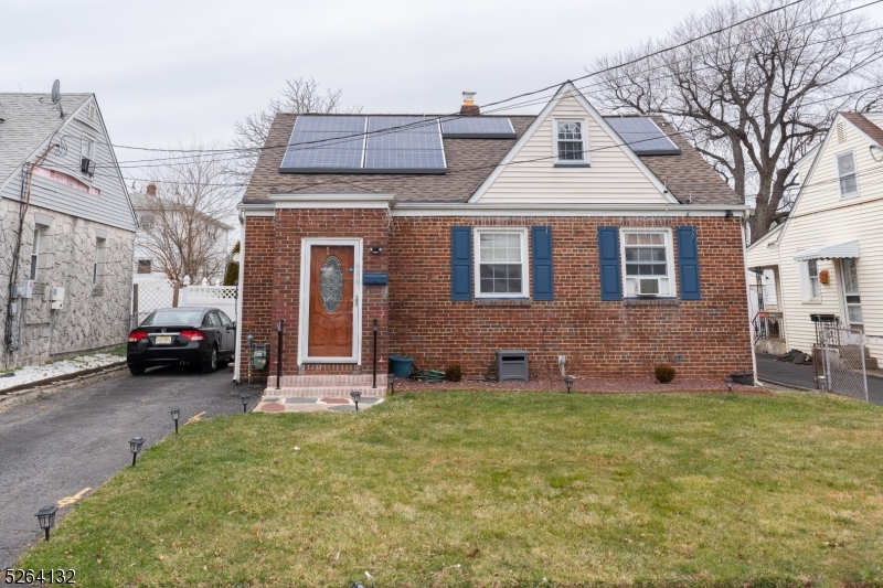 Welcome to this Lovely 3 Bedroom, 1.5 Bath Expanded Brick Front Cape in the Heart of Linden. Centrally located and convenient to all Linden has to offer this home is the perfect blend of charm & contemporary living with the added bonus of a partially finished basement, providing additional space for your lifestyle needs. As you step through the front door, you are greeted by a warm and inviting living space, highlighted by an abundance of natural light that fills the room. The three bedrooms provide comfortable retreats, each offering its unique charm. Adjacent to the dining room, the family room beckons with its own charm. French doors not only add a touch of sophistication but also creates a seamless connection to the well-maintained backyard which features new privacy fencing and storage shed(w/electric), providing a private oasis for outdoor activities, gardening, or simply unwinding after a long day. Brand New Boiler. Located in Linden, NJ, this home offers proximity to local amenities, schools, and parks. Enjoy the convenience of nearby shopping and restaurants, with easy access to transportation for commuting ease. Don't miss the opportunity to make this delightful Cape Cod residence your own.