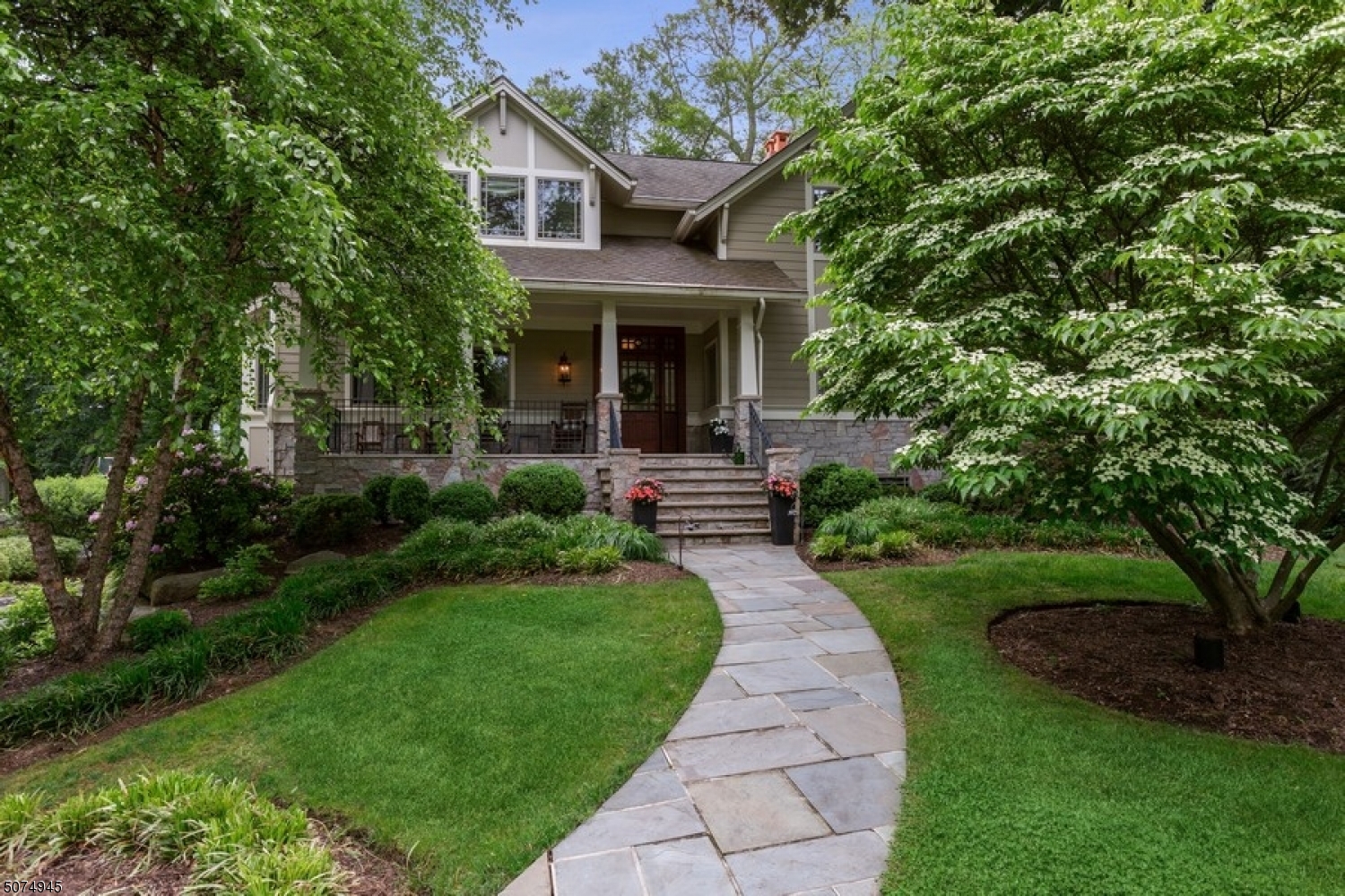Gorgeous custom-built home on one of the most desirable streets in Rolling Hill. Features 6 generous size BRs, 4 Full and 1 half Baths. Formal living room w/fireplace, and office/library w/fireplace. Sun-filled gourmet kitchen with quartz center island & butler's pantry. Large family room with masonry fireplace & French Doors leading to a 2 tier bluestone patio with built-in gas grill and mini refrigerator.  Great floorplan for entertaining inside & out.  A cozy sunroom allows more space to enjoy a cup of coffee while watching the sun rise.  Radiant heated floors throughout the home. Master Bathroom with steam shower & jacuzzi tub. Oversized, heated 3 car garage with lots of storage. Central vacuum, heated & covered gutters, fully fenced backyard. Lower level provides multi-functional space and ample storage.