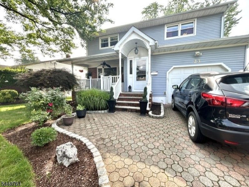 Welcome to 23 Charles St - an adorable and beautifully maintained  4 bedroom, 2.5 bath home tucked away on a quiet dead-end street. This inviting home offers the perfect blend of comfort, charm and convenience.Inside, you'll find hardwood floors throughout, creating a warm and timeless feel.  The spacious layout includes four generously sized bedrooms and a full finished basement, providing plenty of additional living space for a recreation room, home office, gym, or media room.Step outside to enjoy morning coffee on the front porch and cocktails on the private back deck overlooking the fully fenced yard - ideal for entertaining, relaxing, gardening, or play.  A one-car garage adds everyday convenience and extra storage.Commuters will appreciate the home's prime location, just minutes from the Garden State Parkway, nearby train line offering easy access to NYC and surrounding areas. Close to shopping, dining, parks and schools, this home combines suburban tranquility with exceptional accessibility.Don't miss the opportunity to make this charming Clark home your own!!