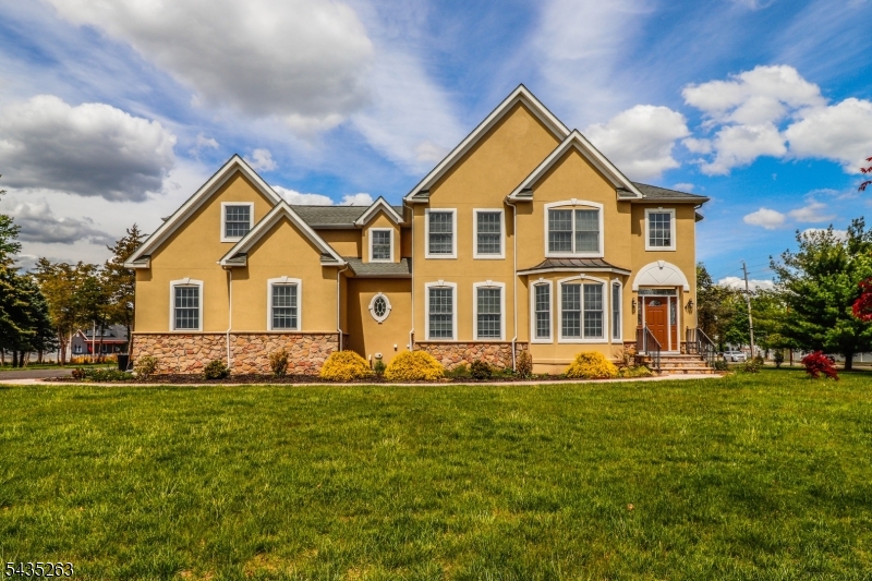 Welcome to this Rare 1-Acre Brenner Estates Colonial in Franklin Township, with Expansive Layout, Dual Suites & Entertainer's Backyard!, Set on private 1-acre lot in the prestigious Brenner Estates community of Franklin Township. this rare Colonial offers exceptional space, dual primary suites, and outstanding outdoor living. A beautifully maintained home combining privacy, flexibility, and convenience-just minutes from Rutgers University, major medical centers, transit, charter schools, and everyday amenities, A dramatic 2-story foyer with rich hardwood flooring and recessed lights leads into expansive, light-filled living spaces designed for comfort and entertaining,. The Granite kitchen flows into the main living area, anchored by a gas fireplace. This home features two expansive primary suites, offering excellent flexibility for  guests, or private retreats, and an unfinished bonus room. Dual staircases add both function and architectural appeal. The full-height lower level w/soaring ceilings and painted floors offers outstanding potential for future finishing--ideal for gym, media room, or additional living space. Outdoor living includes custom stone walkways, a large patio with fire pit, and a spacious deck, overlooking a serene, tree-lined backyard. Additional features include a 3-car side-entry garage, two-zone HVAC, and a storage shed. A rare opportunity in Franklin Township offering space, privacy, and long-term flexibility in a highly desirable location.