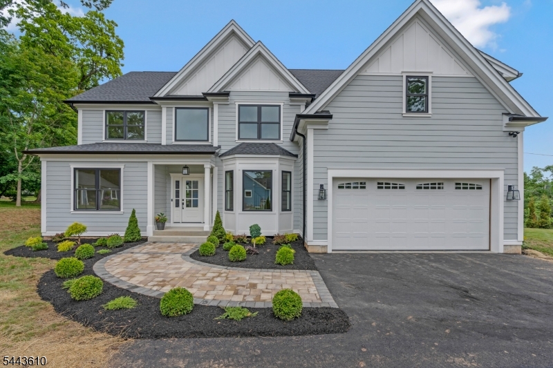 Welcome to 752 Valley Road, a stunning new construction home where thoughtful design, exceptional craftsmanship, and modern luxury come together. Offering 4 bed, 3.1 baths, and a 2-car garage. This beautifully appointed residence is designed for today's lifestyle. The open-concept floor plan features soaring ceilings, HW floors, custom millwork, stately moldings, recessed lighting, and elegant five-panel doors throughout. The chef's kitchen impresses with quartz countertops, an oversized center island, custom cabinetry, pantry, and premium  appliances. Sliding doors open to the level backyard, creating seamless indoor-outdoor living. The kitchen flows into the spacious FR with a gas fireplace, while formal LR and DR with custom millwork provide elegant spaces for entertaining. A powder room, mudroom, and garage access complete the main level. Upstairs, the luxurious primary suite features a vaulted shiplap ceiling, expansive walk-in closet, and spa-inspired bath with dual vanities, a soaking tub, and an oversized shower. Three additional bedrooms include one with a private ensuite bath, while the other two share a beautifully appointed hall bath. A convenient second-floor laundry room adds everyday functionality. The exterior showcases durable Hardie Plank siding and a fully fenced yard perfect for relaxing, playing, or entertaining. A beautifully crafted home combining timeless design, quality finishes, and exceptional comfort in every detail. Home Warranty Included.