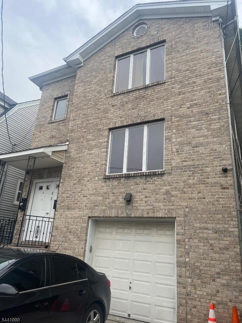 Exceptional two-family residence, newer construction.  This property offers the perfect blend of modern comfort and smart investment potential.  Central Air and Central Heating.  Each identical unit offers large living room, kitchen, 3 bedrooms, and 2 bathrooms.  Flexible space on the lower area with a summer kitchen, bedroom, and bathroom.