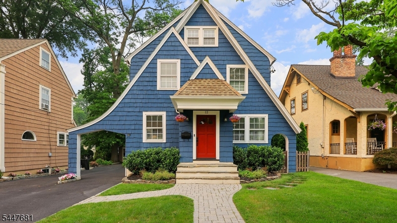 Welcome to this absolutely charming Dutch Colonial, where timeless character blends beautifully with modern updates. Featuring hardwood floors throughout this inviting home offers warm , light filled living spaces designed for comfortable everyday living. The renovated kitchen and updated bathrooms provide contemporary style and convenience, while the cozy wood burning fireplace in the living room creates the perfect gathering space on chilly evenings.The second floor offers 3 spacious bedrooms and full bath. Privately situated on the third floor, the primary en suite serves as a peaceful retreat. Stay comfortable all summer long with energy efficient mini split systems installed in every bedroom and the main level. Step outside to the backyard deck, an ideal space for barbecues, entertaining guests, or simply relaxing in your own backyard oasis. Conveniently located close to town, schools, shopping , dining and transportation, this home offers the perfect combination of charm, comfort and location.  NOT IN A FLOOD ZONE   Fireplace, chimney, flue and garage roof conveyed in "as is" condition with no known issues. Refrigerator in basement included.